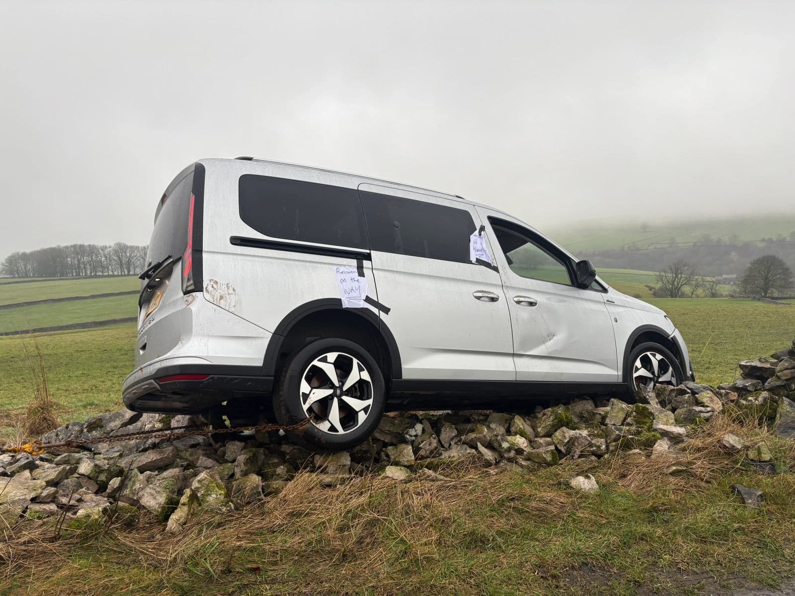 A van recovered from a dry-stone wall on a Peak District road